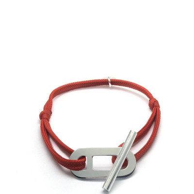 Bracelet manille stylisée fermoir T barre en argent